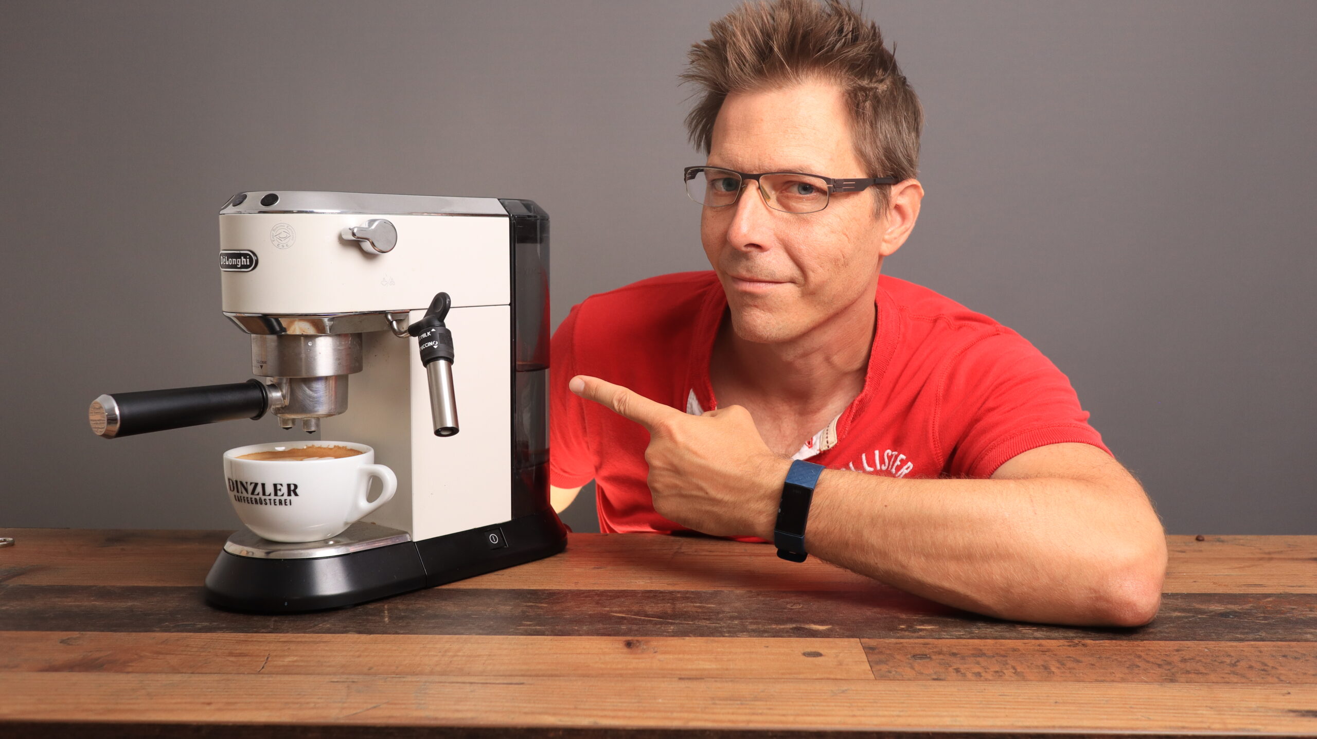 Man with Delonghi EC685 home espresso machine