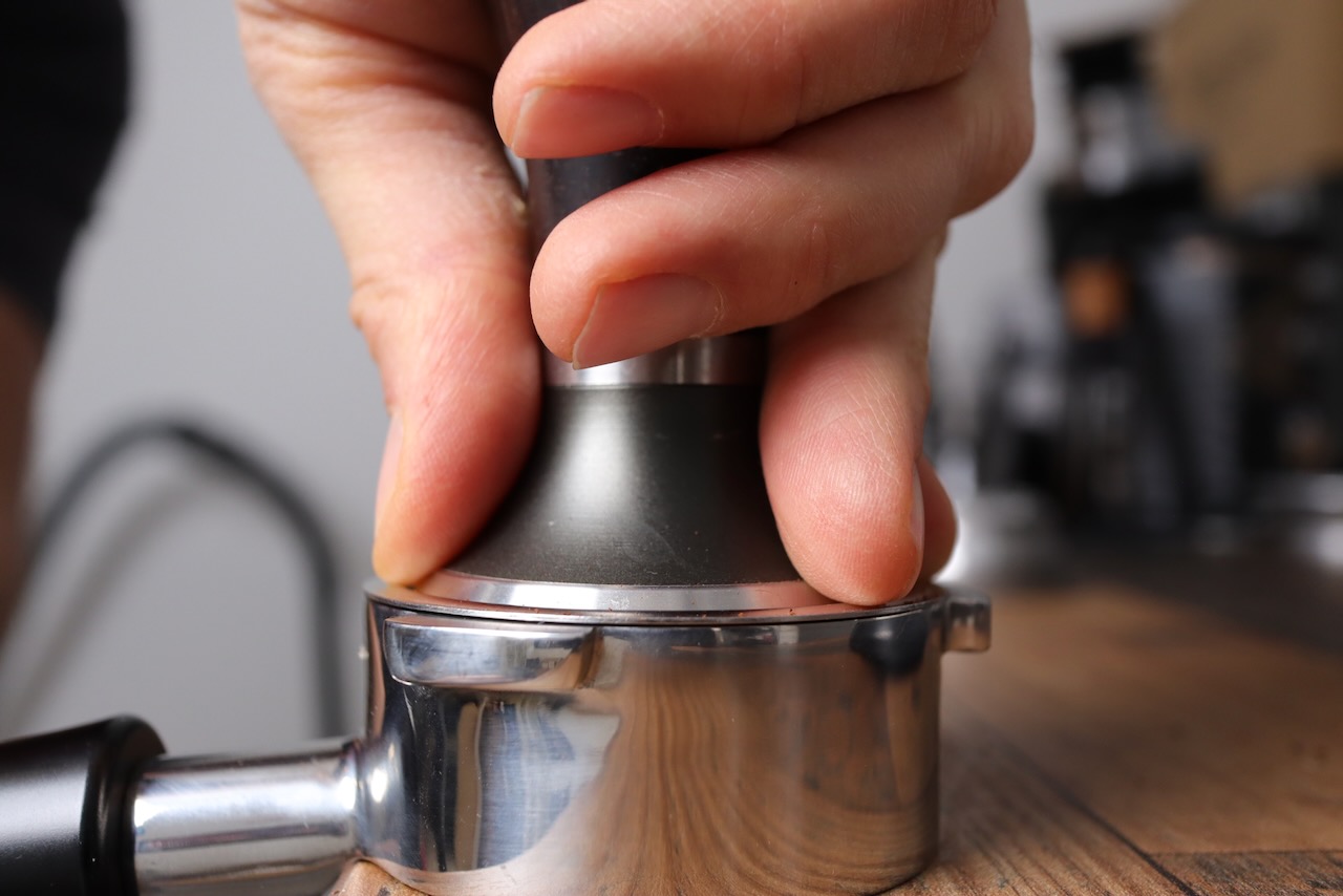 Tamping with a 51mm tamper in the Dedica Delonghi Dedica tamper is 51mm