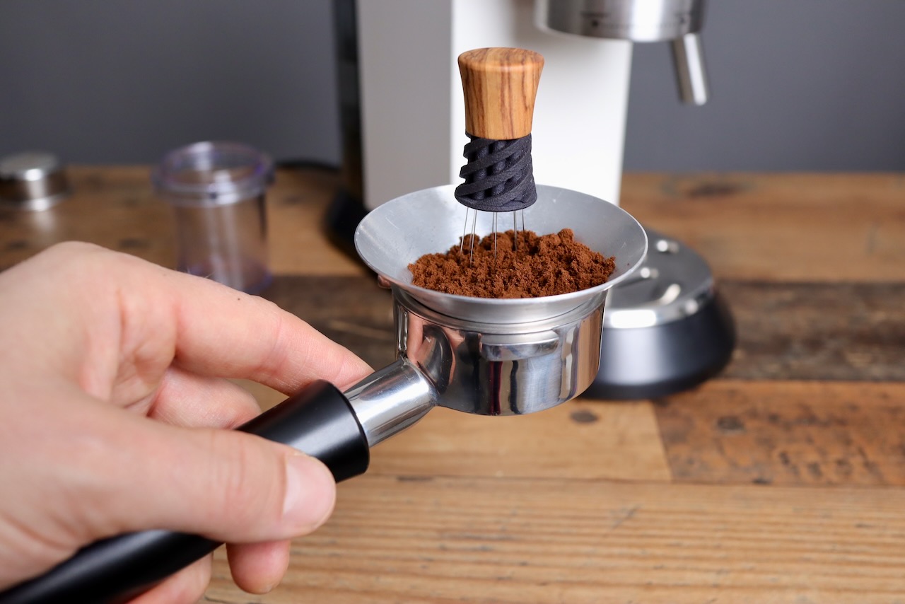 Using the WDT tool and a funnel to dose for the Delonghi Dedica Delonghi Dedica workflow with WDT