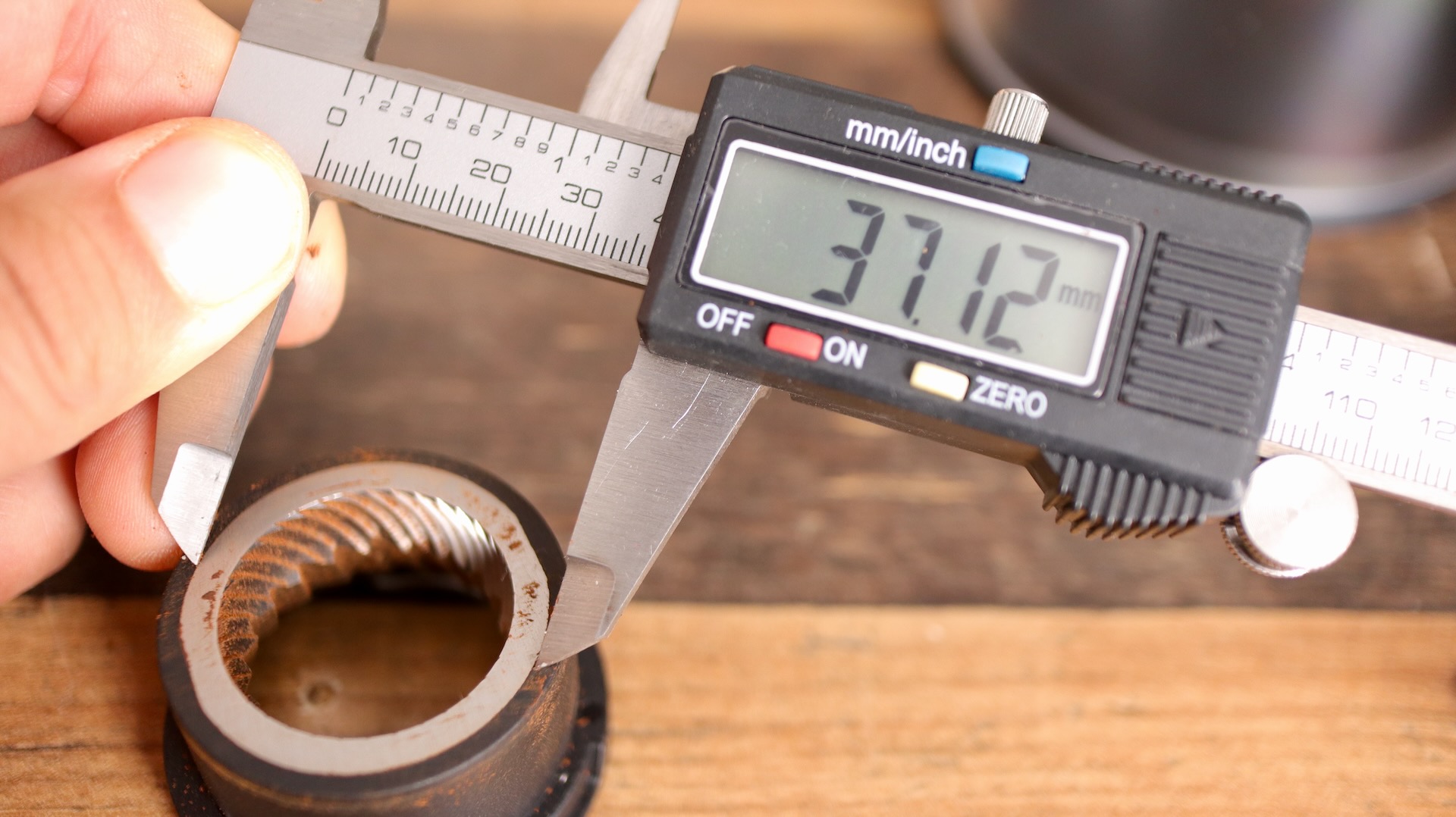 The burrs inside the Meraki espresso machine are 37mm